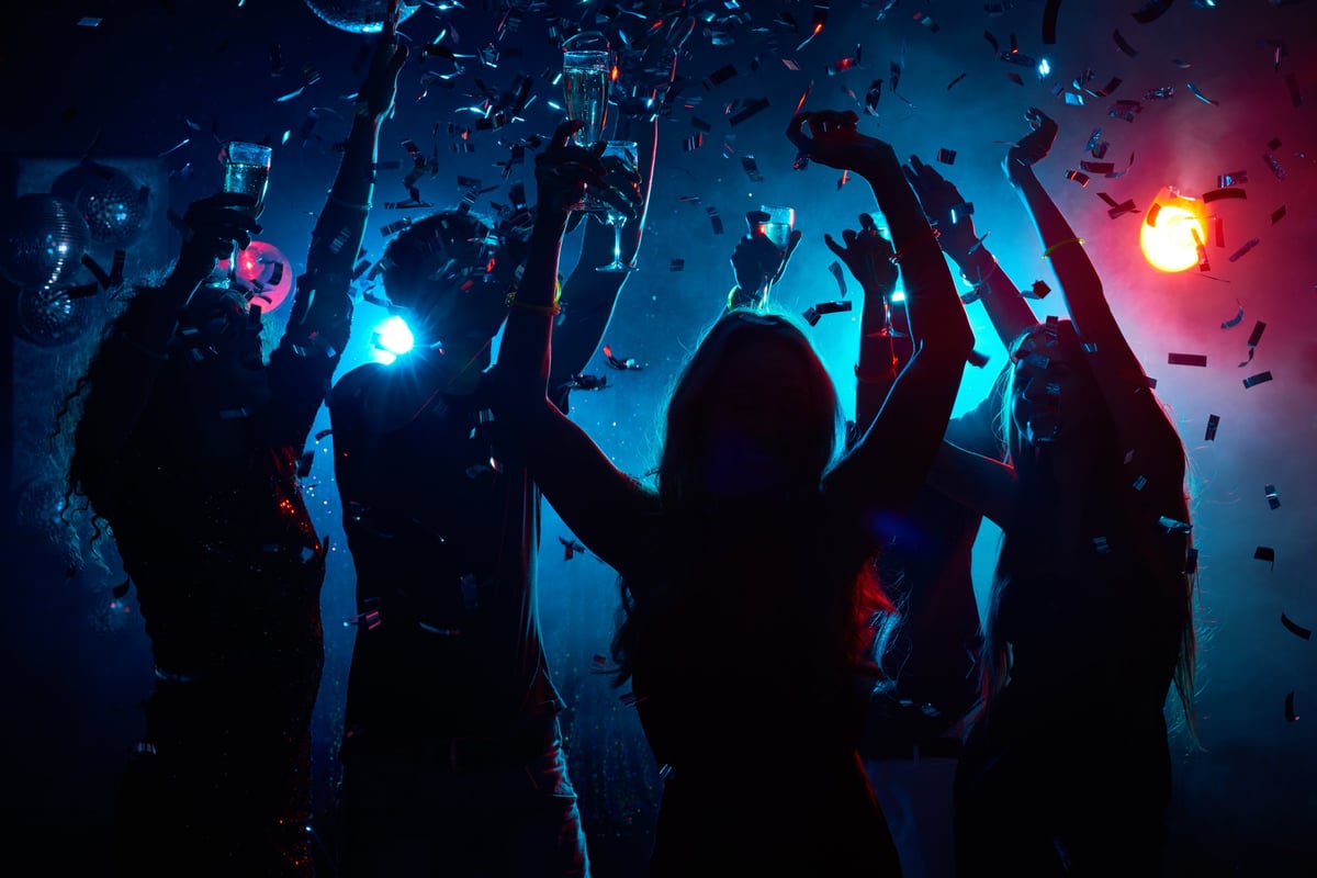 Crowd silhouettes at club event